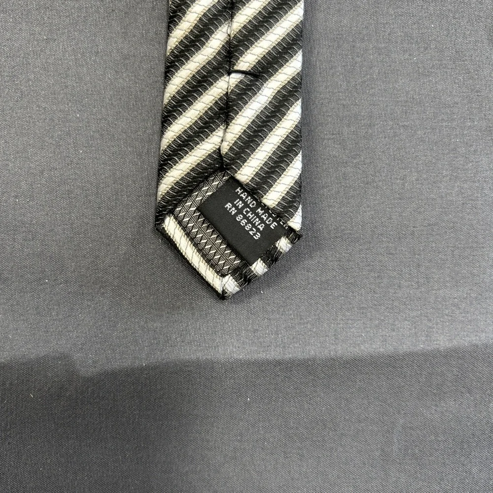 George brand necktie featuring a striped pattern